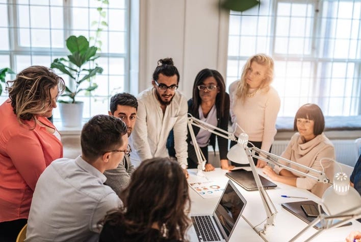 Diverse professionals working together